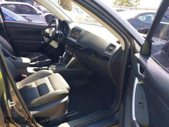 2014 Mazda CX-5 Grand Touring with VIN JM3KE2DY8E0383206, listed as a IAAI auction lot 40205756 with 120,231 mi miles. Bid and sale history available at carsss.com. Image 5.