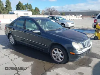 2003 Mercedes-Benz C 2.6L with VIN WDBRF61J43F327324, listed as a IAAI auction lot 41712988 with 305,496 mi miles. Bid and sale history available at carsss.com. Image 1.