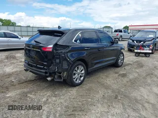 2020 Ford Edge Titanium z VIN 2FMPK4K90LBA55977, wystawiony jako IAAI lot #42257174 z przebiegiem 121 079 mil mil oraz . Historia ofert i sprzedaży dostępna na DreamBid. Obrazek 4.