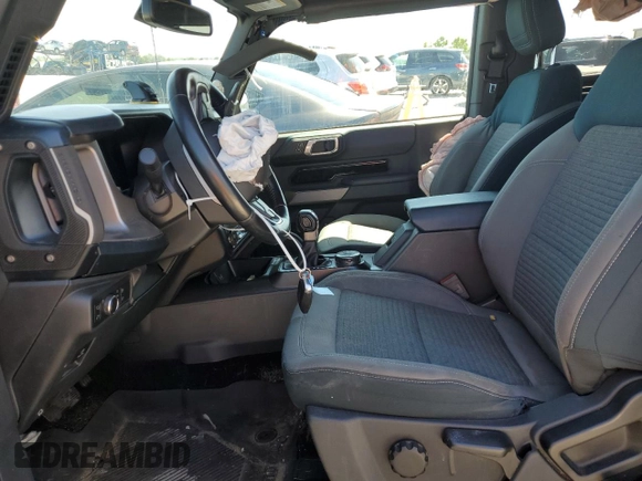 2021 Ford Bronco z VIN 1FMDE5APXMLA63439, wystawiony jako Copart lot #58100614 z przebiegiem 42 973 mil mil oraz Szkoda całkowita • Salvage title. Historia ofert i sprzedaży dostępna na DreamBid. Obrazek 7.