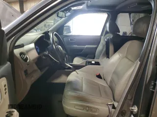 2013 Honda Pilot Touring z VIN 5FNYF3H91DB034638, wystawiony jako Copart lot #59858755 z przebiegiem 115 445 mil mil oraz Szkoda całkowita • Salvage title. Historia ofert i sprzedaży dostępna na DreamBid. Obrazek 7.