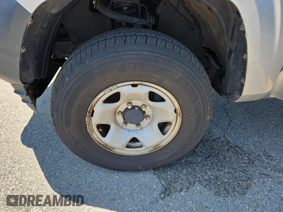 2018 Toyota Tacoma SR with VIN 5TFSX5EN6JX062775, listed as a IAAI auction lot 42774090 with 146,583 mi miles and . Bid and sale history available at DreamBid. Image 36.