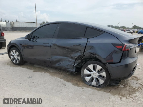 2024 Tesla Model Y Long Range with VIN 7SAYGDEE3RA253354, listed as a Copart auction lot 50524105 with 10,353 mi miles and Salvage Title. Bid and sale history available at DreamBid. Image 2.