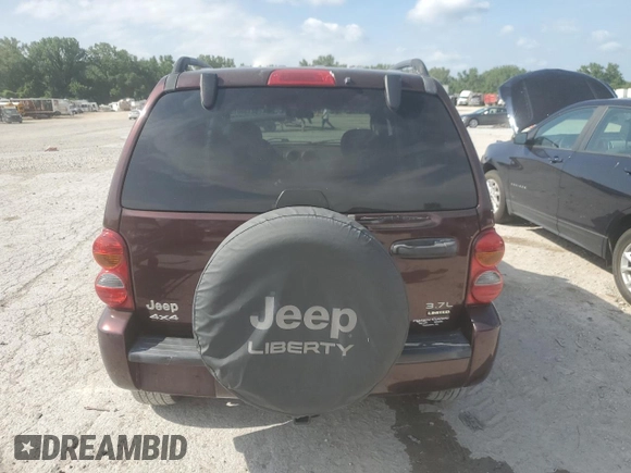 2004 Jeep Liberty Limited with VIN 1J4GL58K74W163637, listed as a Copart auction lot 62154015 with 93,645 mi miles and Salvage title. Bid and sale history available at DreamBid. Image 6.