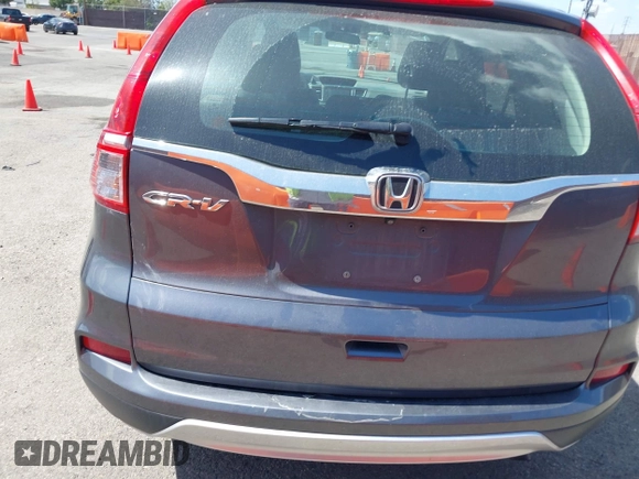 2015 Honda CR-V EX with VIN 3CZRM3H58FG711070, listed as a IAAI auction lot 41948788 with 140,130 mi miles and . Bid and sale history available at carsss.com. Image 16.