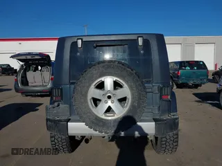 2008 Jeep Wrangler Sahara with VIN 1J4FA54108L543764, listed as a IAAI auction lot 41867734 with 186,145 mi miles and . Bid and sale history available at DreamBid. Image 17.