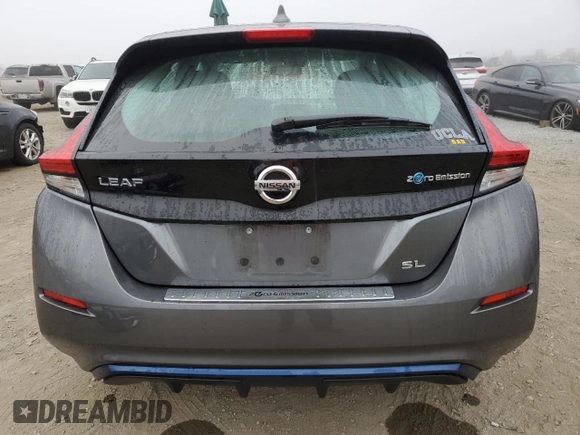 2019 Nissan LEAF SV z VIN 1N4AZ1CP1KC306656, wystawiony jako Copart lot #83686454 z przebiegiem 50 199 mil mil oraz Szkoda całkowita • Salvage title. Historia ofert i sprzedaży dostępna na DreamBid. Obrazek 6.