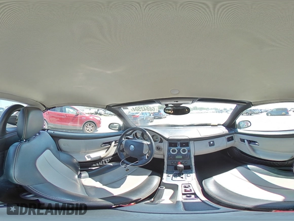 1999 Mercedes-Benz SLK-Class with VIN WDBKK47F5XF129037, listed as a Copart auction lot 68842504 with 74,397 mi miles and Salvage Title. Bid and sale history available at carsss.com. Image 12.