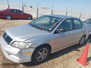 2003 Mitsubishi Lancer OZ-Rally with VIN JA3AJ86E23U069464, listed as a IAAI auction lot 41775000 with 148,735 mi miles. Bid and sale history available at carsss.com. Image 2.