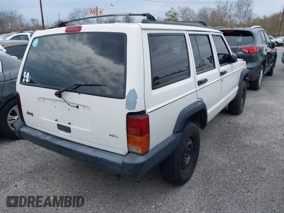 1998 Jeep Cherokee Sport with VIN 1J4FT68S5WL199283, listed as a IAAI auction lot 38377285 with 208,074 mi miles. Bid and sale history available at carsss.com. Image 4.