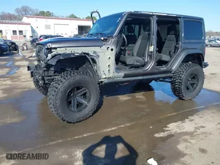 2019 Jeep Wrangler Unlimited Sport S with VIN 1C4HJXDG2KW612913, listed as a IAAI auction lot 41519311 with 104,583 mi miles. Bid and sale history available at carsss.com. Image 21.