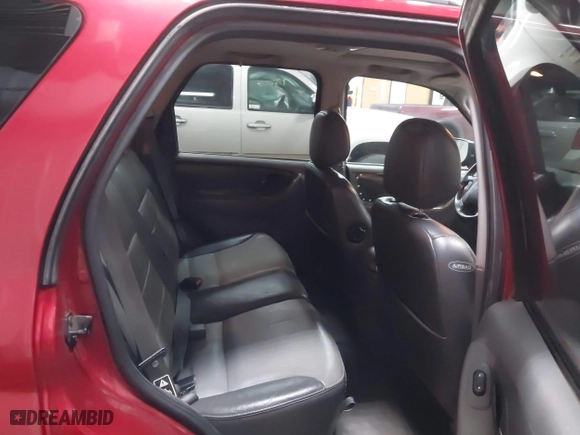 2003 Ford Escape XLT Popular 2 with VIN 1FMCU93173KA52806, listed as a IAAI auction lot 41696250 with 138,338 mi miles. Bid and sale history available at carsss.com. Image 8.