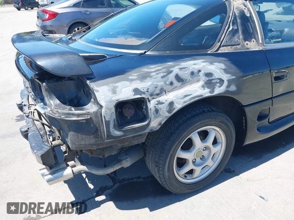 1995 Mitsubishi 3000GT GT z VIN JA3AM84J1SY026510, wystawiony jako IAAI lot #42298430 z przebiegiem 288 509 mil mil oraz . Historia ofert i sprzedaży dostępna na DreamBid. Obrazek 6.