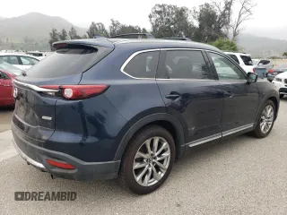 2017 Mazda CX-9 Grand Touring z VIN JM3TCADY3H0140573, wystawiony jako Copart lot #60513145 z przebiegiem 97 793 mil mil oraz Czysty tytuł • Clean title. Historia ofert i sprzedaży dostępna na DreamBid. Obrazek 3.