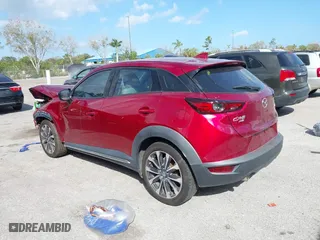 2019 Mazda CX-3 Grand Touring with VIN JM1DKFD70K0431771, listed as a IAAI auction lot 41589257 with 90,119 mi miles. Bid and sale history available at carsss.com. Image 3.