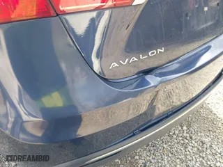 2014 Toyota Avalon Hybrid Limited with VIN 4T1BD1EB5EU024433, listed as a IAAI auction lot 41942865 with 142,377 mi miles. Bid and sale history available at carsss.com. Image 21.