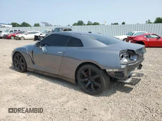 2009 Nissan GT-R Premium z VIN JN1AR54F09M251146, wystawiony jako Copart lot #68059054 z przebiegiem 16 498 mil mil oraz Szkody całkowita. Historia ofert i sprzedaży dostępna na DreamBid. Obrazek 2.