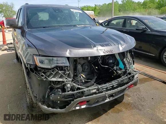 2017 Jeep Grand Cherokee Trailhawk with VIN 1C4RJFLGXHC654112, listed as a Copart auction lot 56397195 with 168,136 mi miles and Salvage title. Bid and sale history available at DreamBid. Image 15.