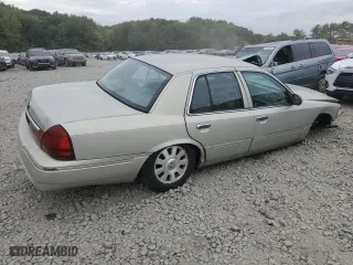 2004 Mercury Grand Marquis LS Premium with VIN 2MEFM75W84X676299, listed as a Copart auction lot 70738294 with 152,180 mi miles and Salvage Title. Bid and sale history available at carsss.com. Image 3.