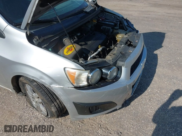 2012 Chevrolet Sonic LS z VIN 1G1JA5SHXC4212170, wystawiony jako IAAI lot #42154640 z przebiegiem 116 725 mil mil oraz . Historia ofert i sprzedaży dostępna na DreamBid. Obrazek 12.