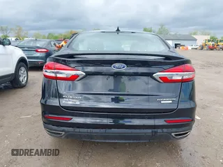 2019 Ford Fusion Titanium with VIN 3FA6P0K92KR248521, listed as a IAAI auction lot 42198307 with 51,844 mi miles and . Bid and sale history available at DreamBid. Image 16.