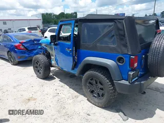 2016 Jeep Wrangler Black Bear with VIN 1C4AJWAG4GL176980, listed as a IAAI auction lot 42744445 with 58,011 mi miles and . Bid and sale history available at DreamBid. Image 3.