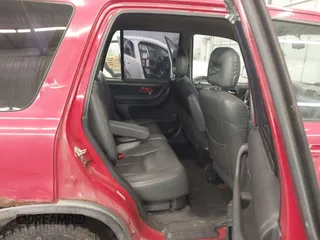 2000 Honda CR-V EX with VIN JHLRD1861YC009880, listed as a IAAI auction lot 41613882 with 238,499 mi miles. Bid and sale history available at carsss.com. Image 8.