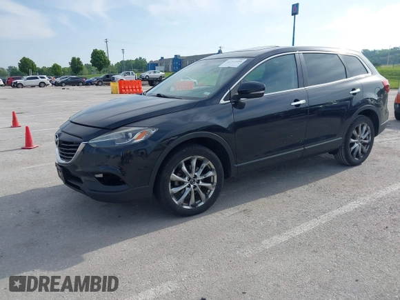 2015 Mazda CX-9 Grand Touring z VIN JM3TB2DA1F0456773, wystawiony jako IAAI lot #42257555 z przebiegiem 152 890 mil mil oraz . Historia ofert i sprzedaży dostępna na DreamBid. Obrazek 21.