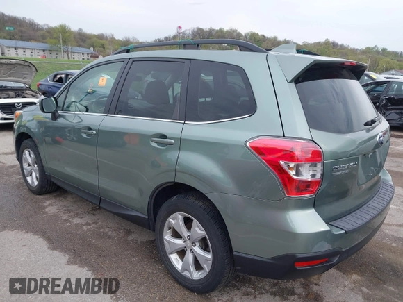 2016 Subaru Forester Limited with VIN JF2SJARCXGH406079, listed as a IAAI auction lot 41974522 with 64,910 mi miles and . Bid and sale history available at DreamBid. Image 3.