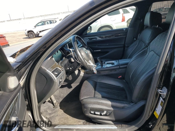 2018 BMW 7 Series 750i with VIN WBA7F0C54JGM23724, listed as a Copart auction lot 89399285 with 141,167 mi miles and Salvage Title. Bid and sale history available at carsss.com. Image 7.