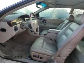 2001 Cadillac Eldorado Touring ETC z VIN 1G6ET12941B101128, wystawiony jako Copart lot #73832624 z przebiegiem Nie podano mil oraz Nie do naprawy. Historia ofert i sprzedaży dostępna na DreamBid. Obrazek 7.