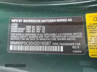 2017 MINI Hardtop Cooper with VIN WMWXP5C55H2D16587, listed as a Copart auction lot 60855195 with 77,769 mi miles and Salvage title. Bid and sale history available at DreamBid. Image 12.