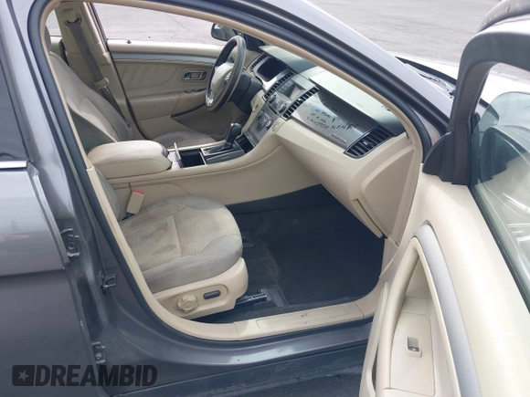 2013 Ford Taurus SEL with VIN 1FAHP2E82DG230831, listed as a IAAI auction lot 42078978 with 207,075 mi miles and . Bid and sale history available at carsss.com. Image 5.