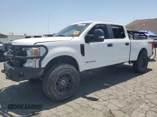 2020 Ford F-250 XL with VIN 1FT7W2BTXLED59332, listed as a Copart auction lot 57712585 with 97,358 mi miles and Salvage title. Bid and sale history available at DreamBid. Image 1.
