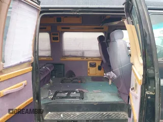 1997 Ford Econoline Commercial with VIN 1FDEE1460VHB16721, listed as a IAAI auction lot 40968310 with 261,169 mi miles. Bid and sale history available at carsss.com. Image 8.