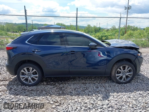 2021 Mazda CX-30 Premium z VIN 3MVDMBDL7MM236474, wystawiony jako IAAI lot #42284515 z przebiegiem 58 565 mil mil oraz . Historia ofert i sprzedaży dostępna na DreamBid. Obrazek 13.