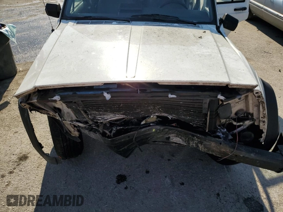 1996 Jeep Cherokee Sport with VIN 1J4FT68S0TL120534, listed as a Copart auction lot 74806974 with 284,147 mi miles and Non Repairable. Bid and sale history available at carsss.com. Image 12.