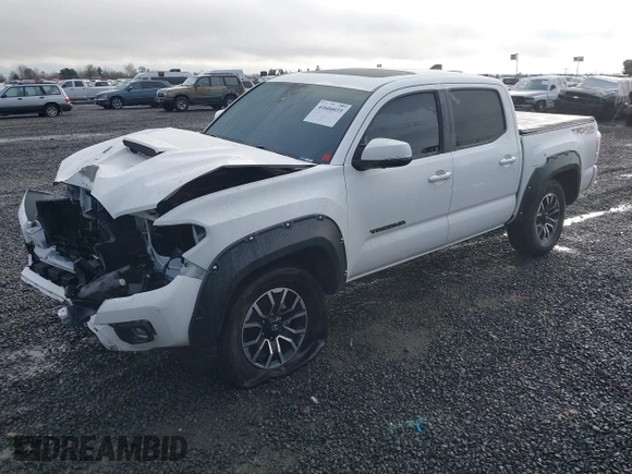 2021 Toyota Tacoma SR z VIN 3TMCZ5AN2MM426723, wystawiony jako IAAI lot #41604033 z przebiegiem 46 522 mil mil oraz . Historia ofert i sprzedaży dostępna na DreamBid. Obrazek 18.