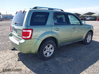 2008 Ford Escape Hybrid with VIN 1FMCU59H68KB66414, listed as a IAAI auction lot 42047695 with 234,039 mi miles. Bid and sale history available at carsss.com. Image 4.