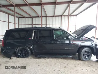 2020 Chevrolet Suburban LT z VIN 1GNSKHKC4LR304237, wystawiony jako IAAI lot #41179977 z przebiegiem 94 302 mil mil oraz . Historia ofert i sprzedaży dostępna na DreamBid. Obrazek 12.