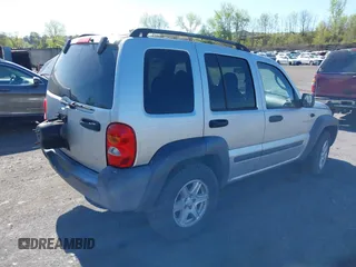 2004 Jeep Liberty Sport with VIN 1J4GL48K84W130852, listed as a IAAI auction lot 42130444 with 99,188 mi miles. Bid and sale history available at carsss.com. Image 4.