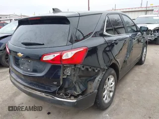 2021 Chevrolet Equinox LT with VIN 3GNAXJEV3MS118110, listed as a IAAI auction lot 41572261 with 79,673 mi miles and . Bid and sale history available at DreamBid. Image 4.