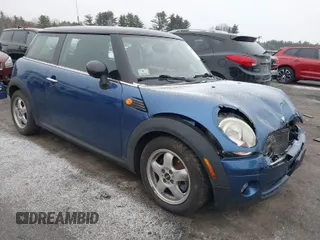 2009 MINI Cooper Hardtop with VIN WMWMF33579TW72543, listed as a IAAI auction lot 41844387 with 125,835 mi miles. Bid and sale history available at carsss.com. Image 1.