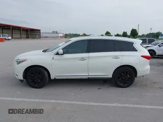 2015 Infiniti QX60 with VIN 5N1AL0MM6FC543767, listed as a IAAI auction lot 42409275 with 128,128 mi miles and . Bid and sale history available at DreamBid. Image 14.