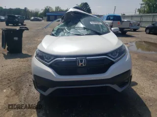 2020 Honda CR-V EX-L z VIN 7FARW1H85LE010622, wystawiony jako Copart lot #51293365 z przebiegiem Nie podano mil oraz Szkoda całkowita • Salvage title. Historia ofert i sprzedaży dostępna na DreamBid. Obrazek 5.
