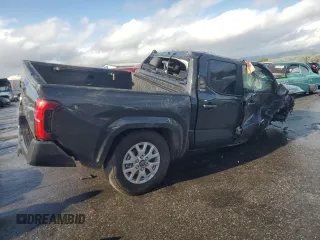 2025 Toyota Tacoma SR with VIN 3TMLB5JN1SM109033, listed as a Copart auction lot 49239575 with Not Provided miles and Salvage Title. Bid and sale history available at DreamBid. Image 3.
