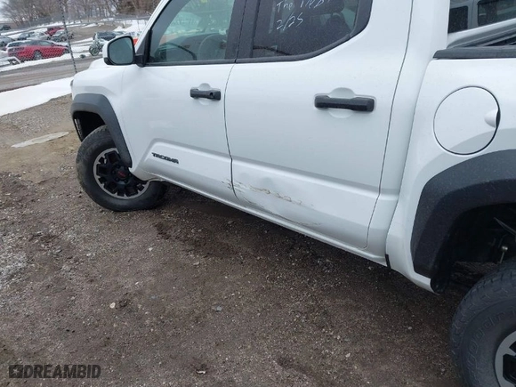 2024 Toyota Tacoma 4WD SR5 with VIN 3TMLB5JN2RM001031, listed as a IAAI auction lot 41743995 with 15,009 mi miles. Bid and sale history available at carsss.com. Image 6.