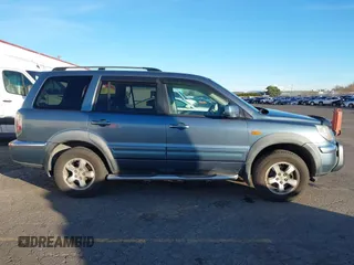 2007 Honda Pilot EX-L with VIN 2HKYF18697H540993, listed as a IAAI auction lot 41243560 with 320,290 mi miles and . Bid and sale history available at DreamBid. Image 13.