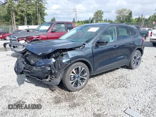 2022 Ford Escape SE Hybrid z VIN 1FMCU9BZ5NUA06681, wystawiony jako IAAI lot #42302156 z przebiegiem 61 582 mil mil oraz . Historia ofert i sprzedaży dostępna na DreamBid. Obrazek 18.