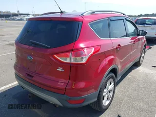 2016 Ford Escape SE with VIN 1FMCU9G99GUA89298, listed as a IAAI auction lot 42013116 with 192,408 mi miles. Bid and sale history available at carsss.com. Image 4.